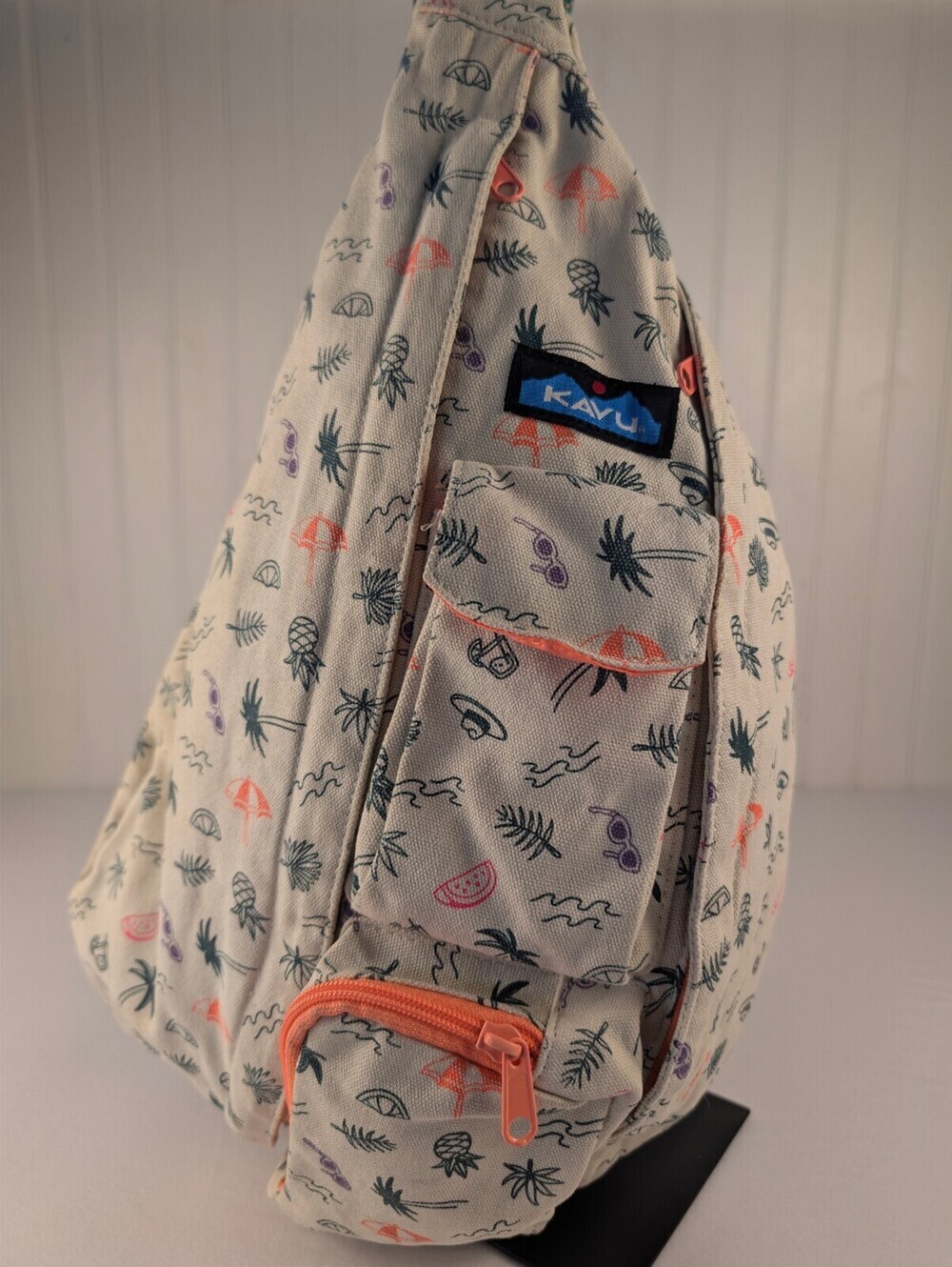 Kavu Rope Sling Bag with Tropical Print and Orange Interior